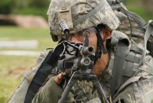 A_U.S._Soldier_with_Charlie_Company,_1st_Battalion,_151st_Infantry_Regiment,_76th_Infantry_Brigade_Combat_Team,_Indiana_National_Guard_waits_for_his_turn_to_fire_his_weapon_during_lanes_training_at_Camp_130602-Z-ZZ999